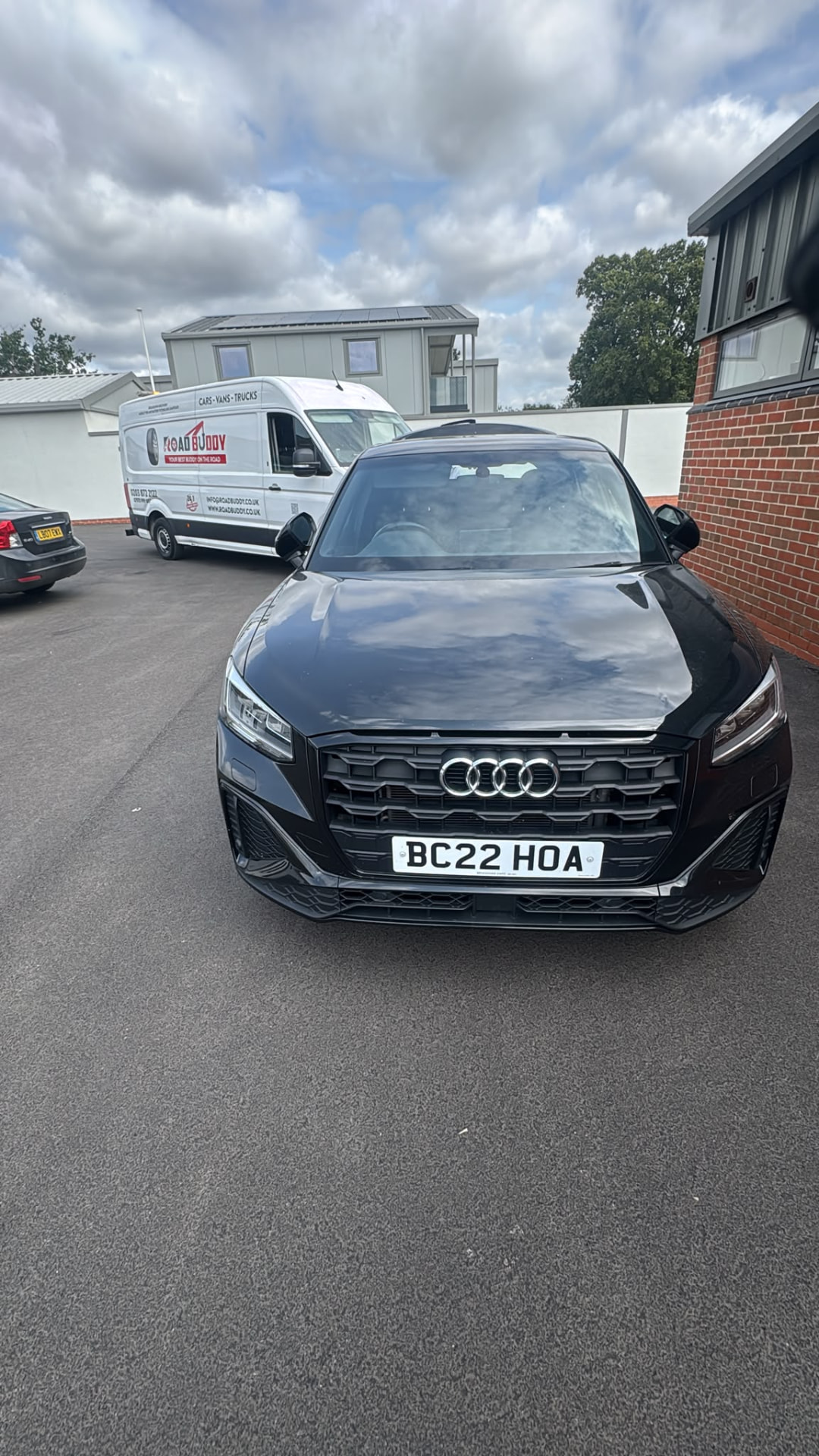 Car beside the Road Buddy van during a mobile tyre fitting job in Kenilworth