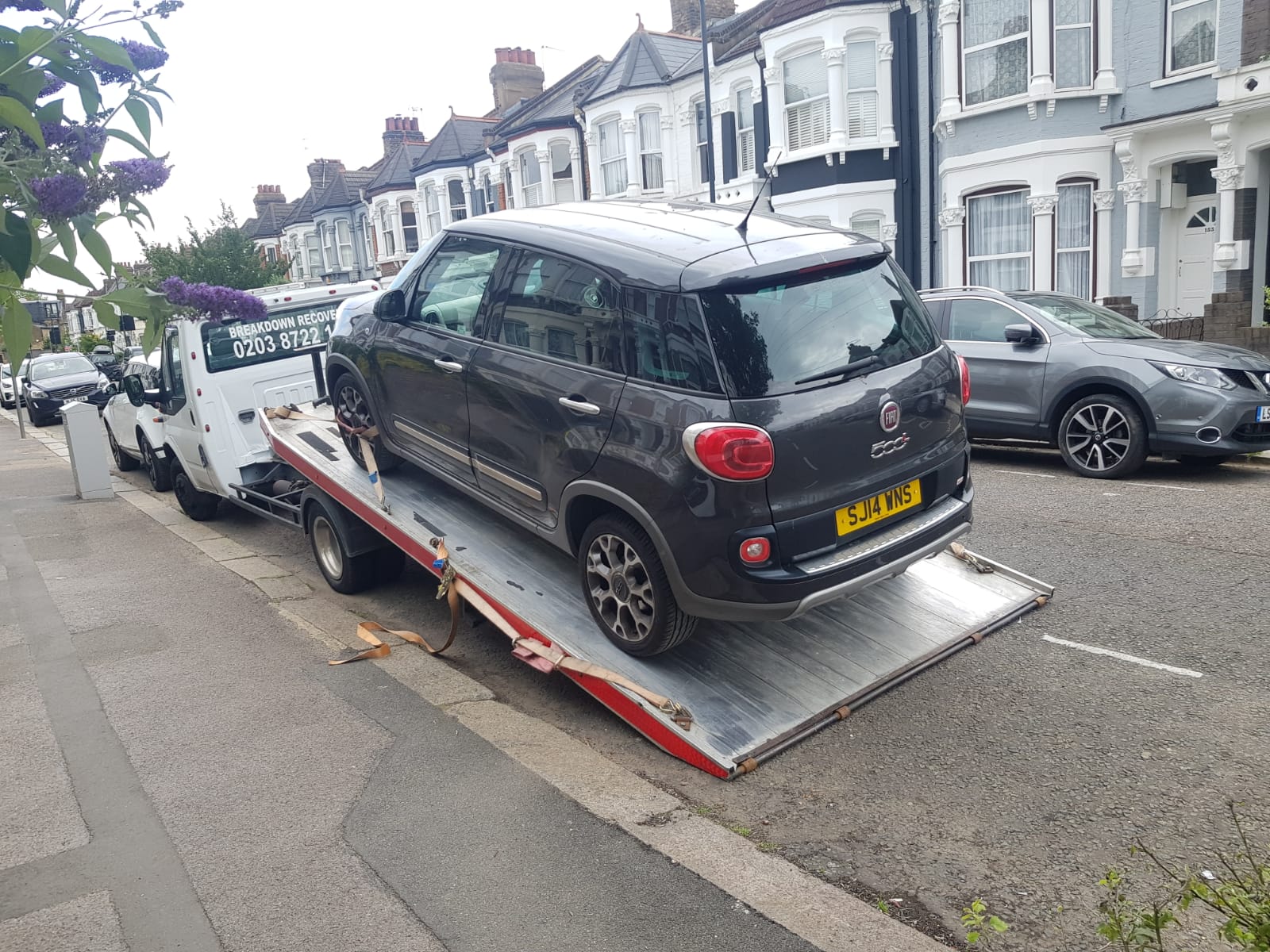 Car loaded on the Road Buddy recovery truck during a breakdown recovery job in Oxford