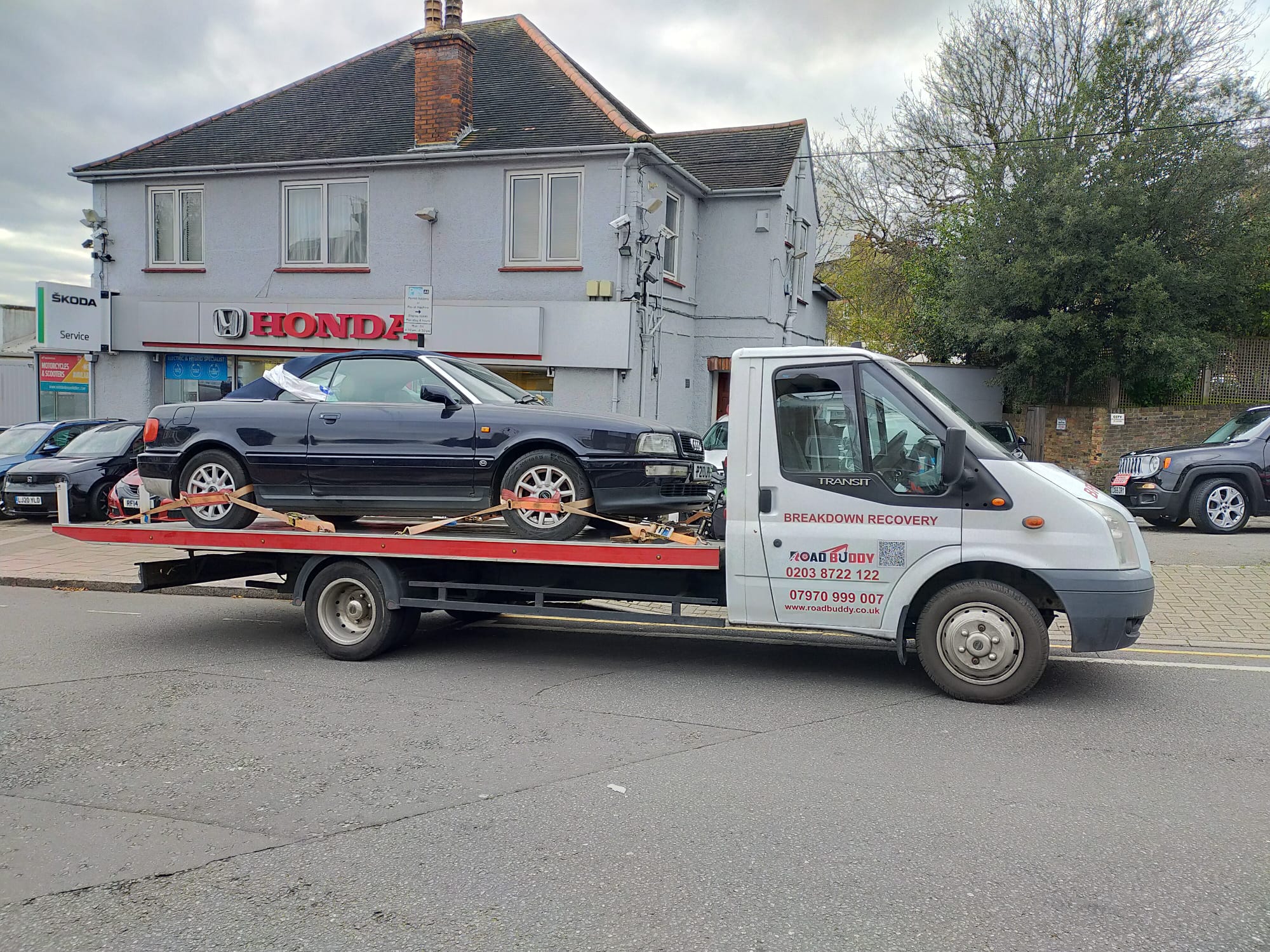 Classic car secured on the Road Buddy recovery truck during a vehicle recovery job in Leicester