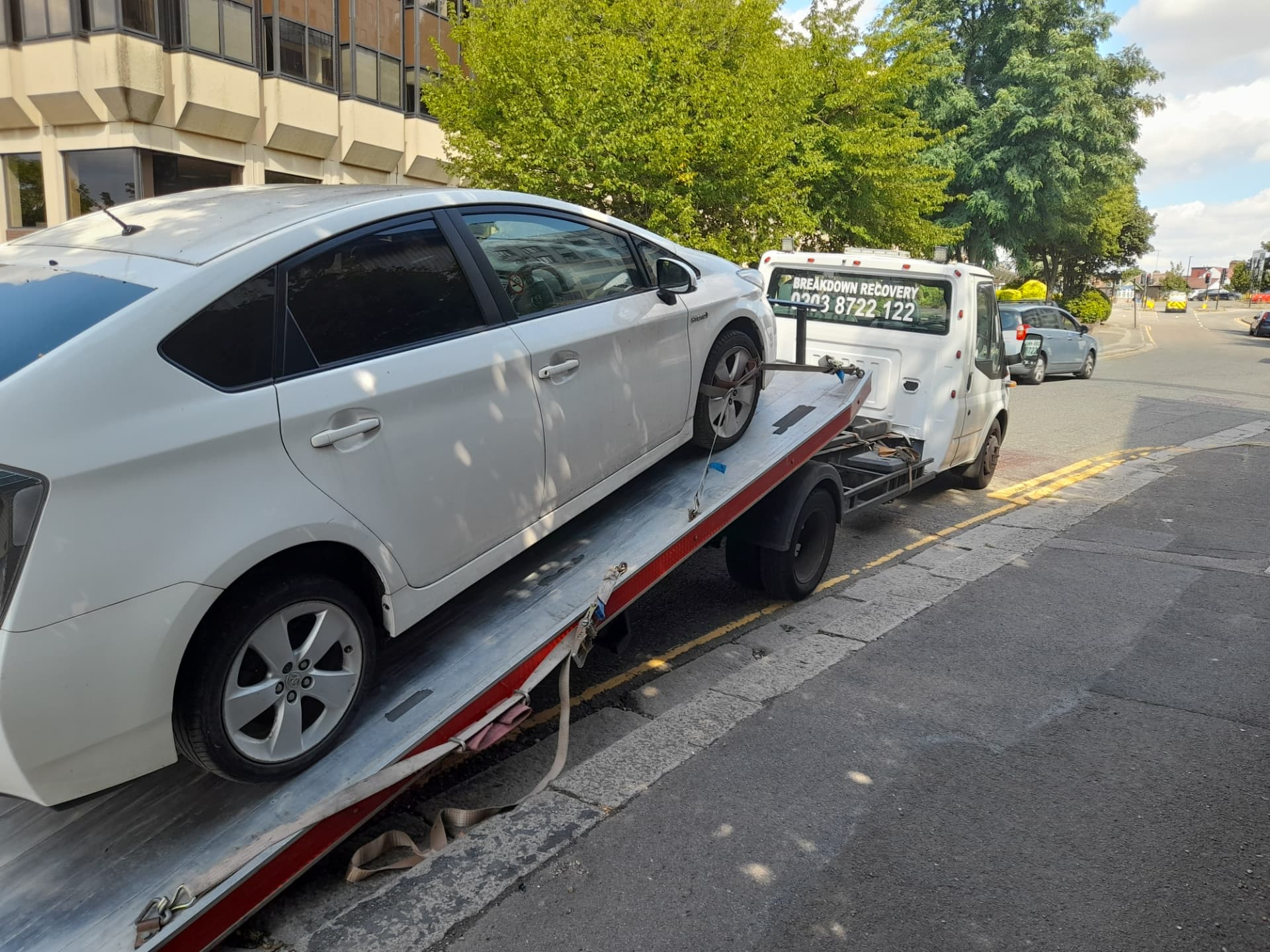 Car being loaded onto the Road Buddy recovery truck during a breakdown recovery job in Rugby